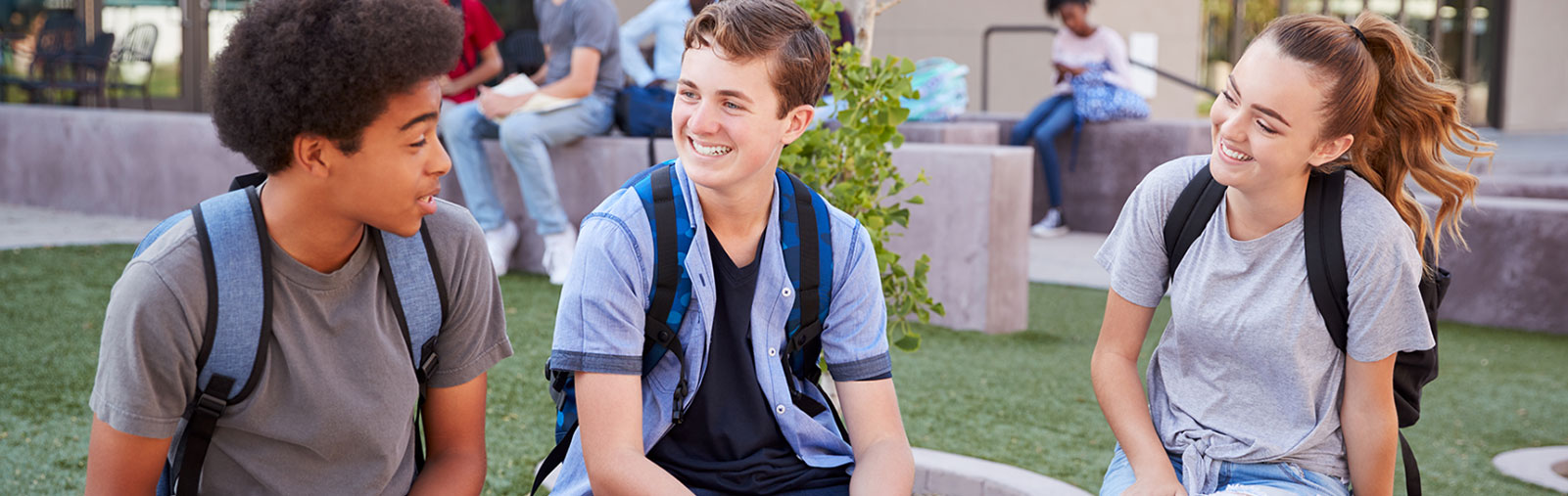 Students sat talking in the yard